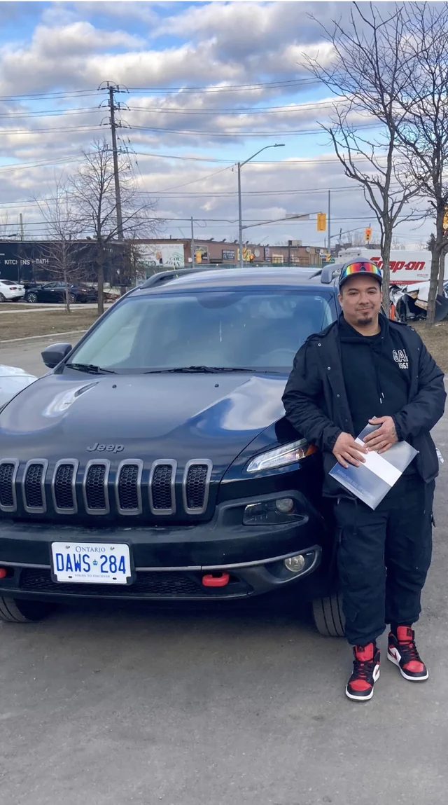 Customer celebrating new car